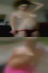 Naked woman putting balls her